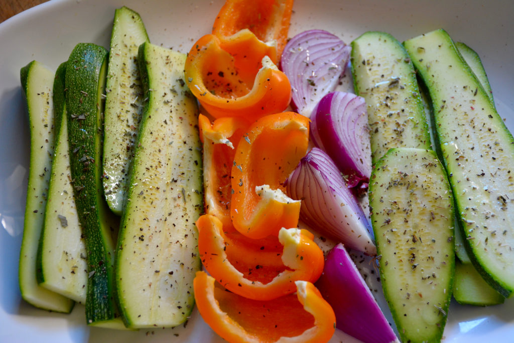 chopped vegetables with dried herbs, avocado oil, salt and pepper