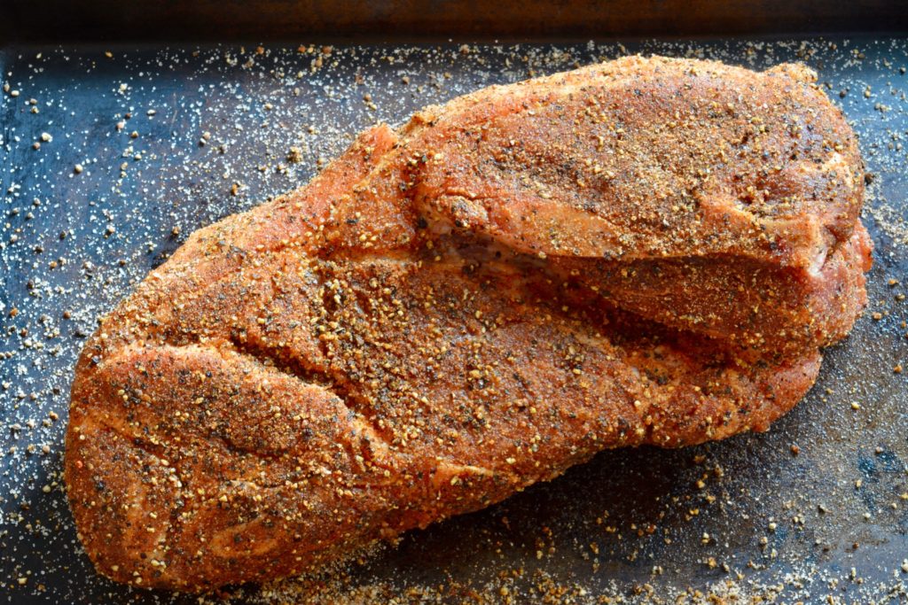 spice rubbed pulled pork before it goes in the oven
